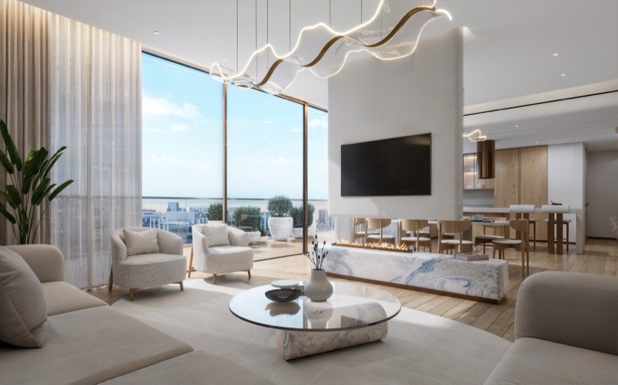 Bright Kaia living room with corner windows over the water